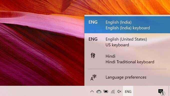 Cara beralih di antara bahasa keyboard di semua perangkat Anda